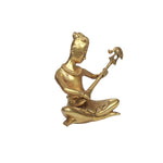 Brass Man with musical instruments