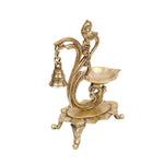 handcrafted brass peacock diya and bell
