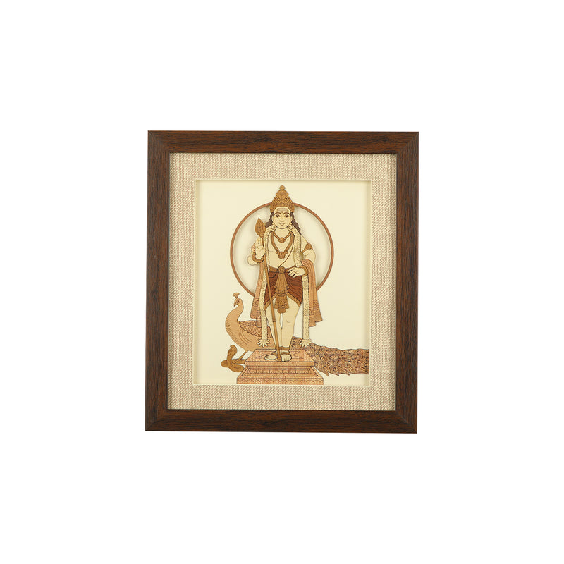 A wooden carving frame containing a decorative artwork depicting lord murugan