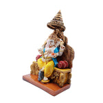 Chhatri Ganesha Sitting On Diwan