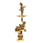 Krishna Standing on Elephant with Diya