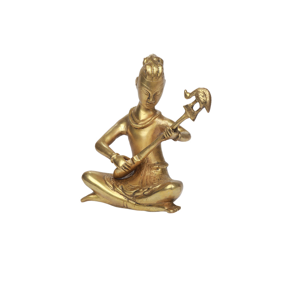 Brass Man with musical instruments