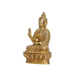 Brass Buddha sitting