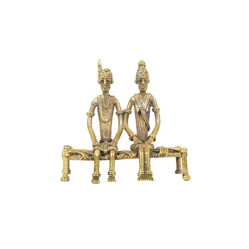DHOKRA ART COUPLE SITING ON COT