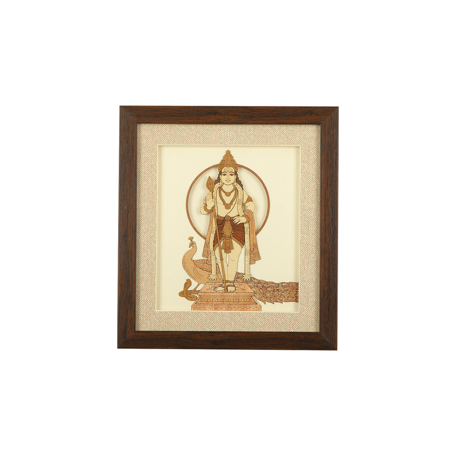 A wooden carving frame containing a decorative artwork depicting lord murugan