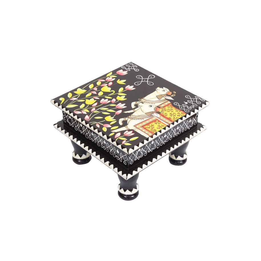 Wooden Cow with Rangoli Chowki