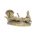 Vishnu sleeping on snake with lakshmi