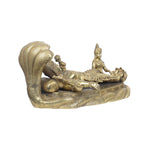 Vishnu sleeping on snake with lakshmi
