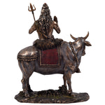 Shiva sitting on Nandi ragaarts.myshopify.com