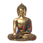 brass meditating buddha