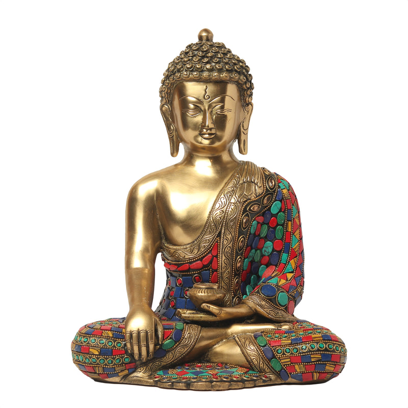brass meditating buddha